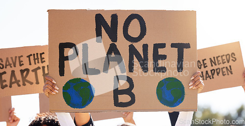 Image of Protest, global warming and poster with a group of people outdoor at a rally or march for conservation. Climate change, freedom and environment with a crowd walking together during a community strike