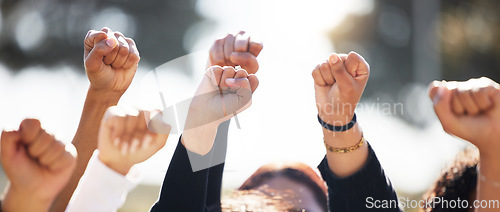 Image of Closeup, group and protest with solidarity, hands and support for human rights, equality or freedom. Zoom, community or protesters with teamwork, activism or union with empowerment, outdoor and crowd