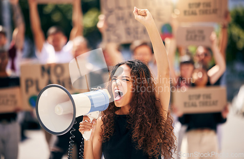Image of Woman, megaphone and shouting with protest crowd, change or environment justice in city. Bullhorn, loudspeaker and female leader for sustainability, speech or voice for environment politics on road