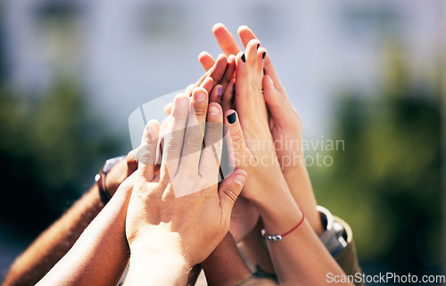 Image of Community, together and hands for success high five, motivation or goals as a group of friends. Trust, collaboration and people with a gesture for team building, support or celebration of solidarity