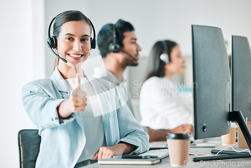 Image of Young woman, thumbs up and call center portrait with smile for agreement, review or yes for customer service. Girl, telemarketing agent and emoji for deal, success and happy at tech support help desk