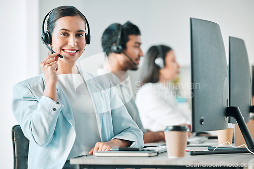 Image of Woman, call center and microphone in portrait with smile, consulting and customer service agency in office. Girl, telemarketing agent and pride for job, contact us and happy at tech support help desk