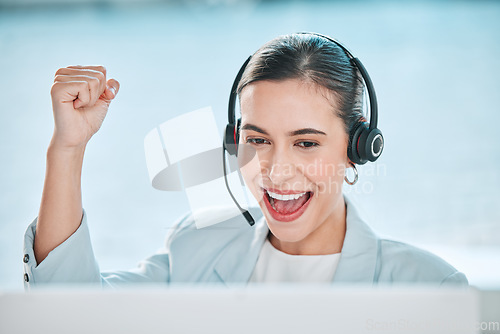 Image of Woman, call center portrait and celebrate with fist, smile or winning with success, bonus or customer service. Girl, telemarketing agent and winner in tech support, help desk or celebration of profit