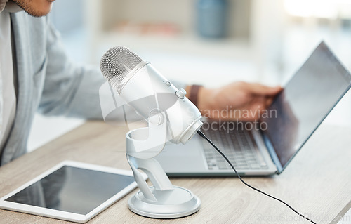 Image of Computer, microphone and business man hands for podcast, online broadcast and web 3.0 platform or digital tablet. Advice, speaker and person voice, talking or news, politics and laptop for radio show