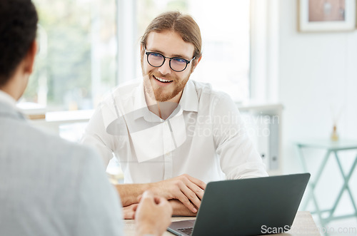 Image of Interview, meeting and business people discussion, planning and startup advice, b2b collaboration or web design consulting. Laptop, website proposal and happy professional man with partner in office