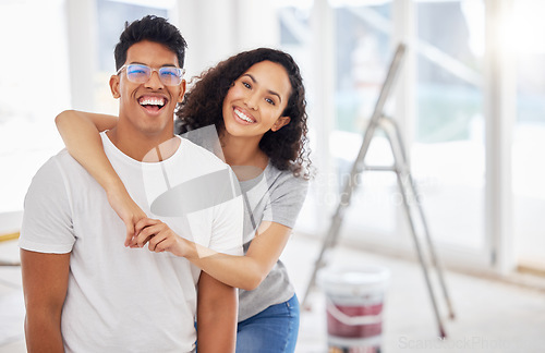 Image of Portrait, renovation and diy with a couple in their new home together for a remodeling project. Construction, real estate or property improvement with a man and woman bonding over house maintenance