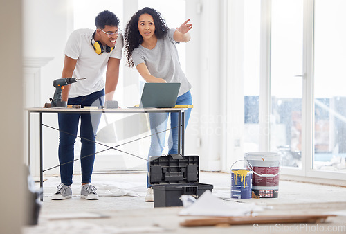 Image of Laptop, renovation and vision with a couple in their new home together for a remodeling project. Construction, real estate or diy property maintenance with a man and woman planning in their house