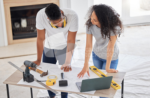 Image of Maintenance, renovation and diy planning with a couple in their new home together for a remodeling project. Construction, real estate or property blueprint with a man and woman talking in the house