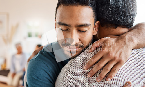 Image of Father, son and hug for love, care or support in family bonding or time together in living room at home. Happy man hugging dad in reunion embrace, relationship or greeting for elderly care at house