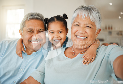 Image of Selfie, love and grandparents with a girl, home and happiness with joy, loving and relax. Portrait, old man or elderly woman with female grandchild, smile or family with retirement, break or vacation