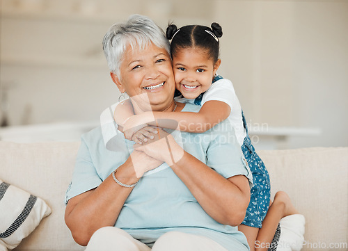 Image of Family, grandmother and grandchild hug with smile in portrait, happiness and bonding at home. Love, care and trust with elderly woman and young child in living room, embrace and happy at house