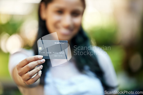 Image of Woman, outdoor and credit card for payment, retail or banking with transaction, shopping or client. Portrait, female person or customer with ecommerce, budget or savings with luxury, discount or sale