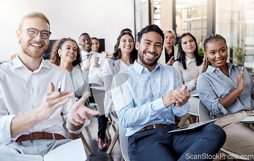 Image of Portrait, applause and business man in an audience with a group of people clapping for a victory or achievement. Winner, wow and motivation with a team of colleagues in a coaching or training seminar
