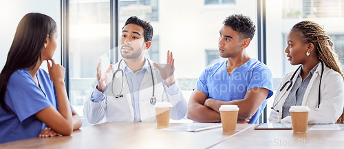 Image of Meeting, coaching and healthcare with a doctor and team in a hospital boardroom for training or discussion. Teamwork, leadership or learning with a medicine professional talking to nurses in a clinic