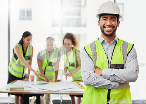 Image of Architecture, man portrait and arms crossed in office planning, team leadership or project management. Engineering, floor plan and happy asian person, contractor or leader in construction development