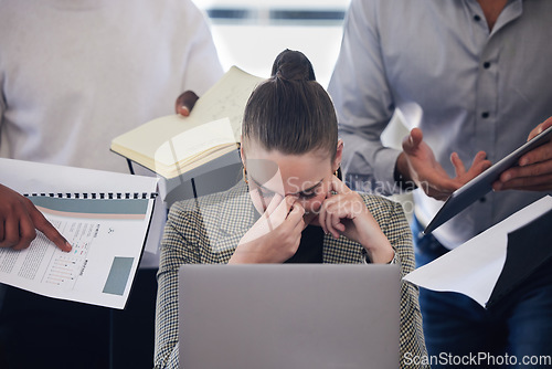 Image of Laptop, stress and multitask with a business woman and demanding colleagues working in the office. Headache, anxiety and deadline pressure with an overwhelmed female employee at work on a computer