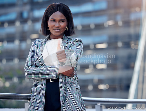 Image of Portrait, thumbs up and black woman in city for business, agreement and success outdoor. Face, like hand gesture and African female professional with emoji for winner, goals and thank you for vote.