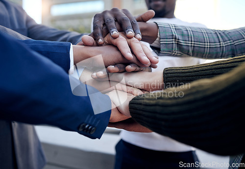 Image of People, hands and team together in celebration, collaboration and solidarity in business. Hand, group and support in company, community or celebrate success in professional unity, staff or workforce