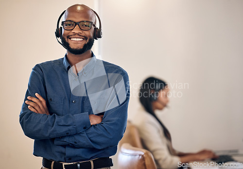 Image of Call center, smile and black man with headset for customer service, crm or telemarketing support. Portrait of african person, consultant or agent with arms crossed for sales, contact us or help desk