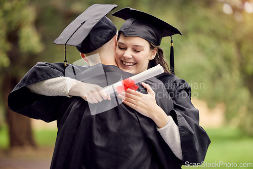 Image of Graduation, certificate and friends hugging outdoor on university campus at a celebration event. Education, success and hug with happy scholarship students cheering together as college graduates