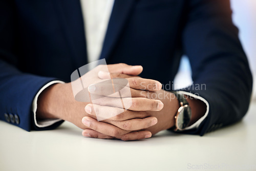 Image of Interview, ready and hands of a businessman at work for a corporate job, recruitment or hr meeting. Professional, closeup and an employee sitting at a table with patience, waiting or working