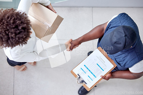 Image of Delivery, clipboard and man shaking hands with woman for shipping, logistics and supply chain service. Ecommerce, online shopping and top view of male courier deliver box, parcel and order to client