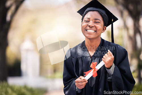 Image of Portrait, education or certificate with a graduate black woman on university campus at a scholarship event. Graduation, smile or degree with a happy female student outdoor for college graduation