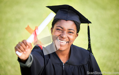 Image of Portrait, graduation or degree with a student black woman on university campus at a scholarship event. Education, smile or diploma with a happy female pupil standing outdoor as a college graduate