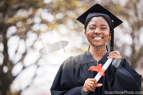 Image of Portrait, smile or certificate with a graduate black woman on university campus at a scholarship event. Education, graduation or degree with a happy female pupil standing outdoor as a college student