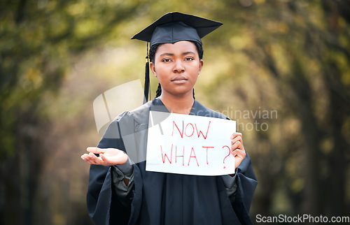 Image of Portrait, graduation and poster with a confused black woman student outdoor at a university event. Doubt, question and a female college graduate standing on campus asking what now after scholarship