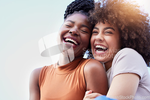 Image of Couple of friends, black women and hug outdoor while laughing with freedom, happiness and lgbtq love. Face of happy, lesbian and african people together for space in sky or funny adventure in London
