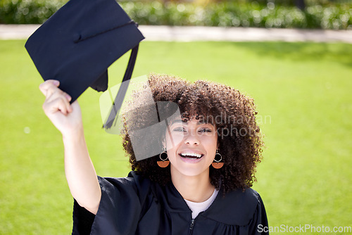 Image of Woman, happy in portrait with graduation cap and success, education qualification and achievement with happiness. Certificate, degree and diploma with female graduate smile, celebration and college