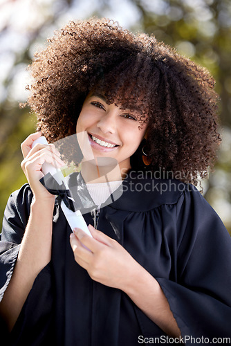 Image of Woman, smile in portrait with diploma and success, education qualification and achievement with happiness. Certificate, degree and academic win with happy female graduate, celebration and college