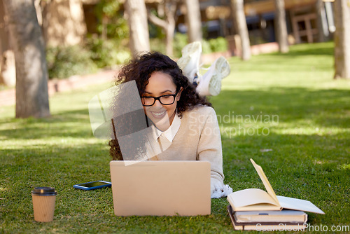 Image of Woman with laptop and notes studying in park for education in nature to relax and learning online. Smile, research and happy university student in campus garden with computer and books for project.