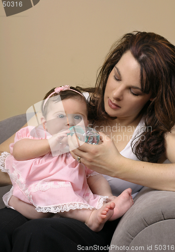 Image of Feeding baby