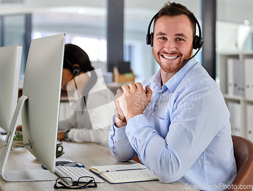 Image of Business man, crm and portrait at a call center company with phone consultation and smile. Telemarketing, web consulting and customer service with contact us work of male employee with internet help