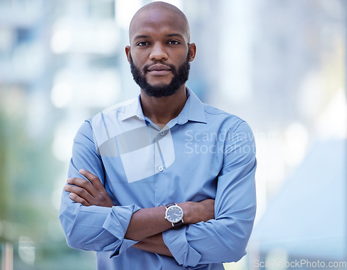 Image of Black man, business executive and portrait with company vision and arms crossed in office. Leadership, boss and African male person with corporate confidence and professional ready for ceo work