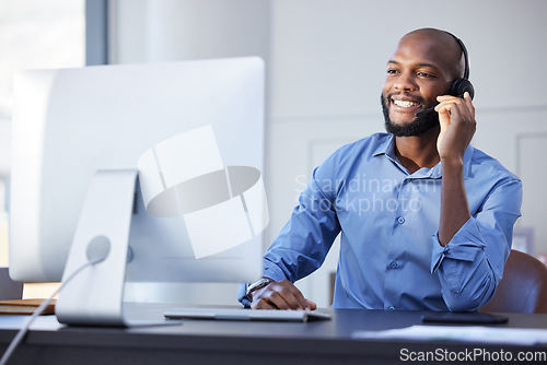 Image of Black man, call center talk and phone consultation with web support and customer service in office. Computer help, contact us and telemarketing job of a African male employee with communication