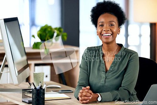 Image of Happiness, pride and portrait of black woman at desk with smile, computer and African entrepreneur with smile. Happy face of businesswoman in office, small business startup and receptionist at agency