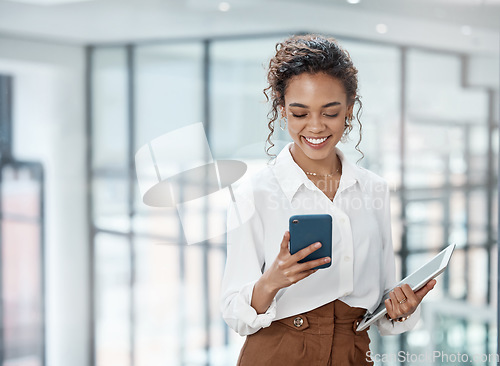 Image of Business, woman and reading on mobile phone with tablet at the office with a smile for online communication. Female professional, technology and typing at a company for conversation on the internet.
