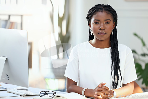 Image of Portrait, employee and black woman with business, serious and professional with success, computer and office. Face, female person and confident consultant with a career, workplace and startup company