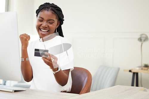 Image of Success, credit card and business woman for online shopping, e commerce and finance, loan or winning bonus. African person or winner celebrate, cheers and fist for banking, excited and cashback