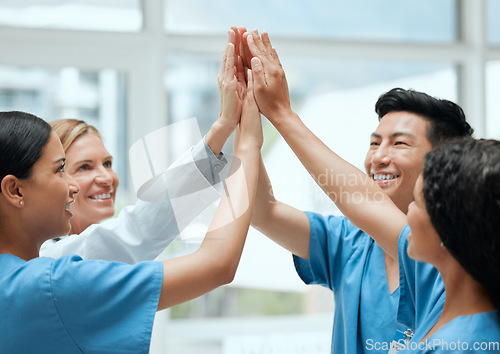 Image of High five, happy or doctors with medical success in celebration of surgery results in hospital with bonus. Team work, winners or nurses smiling to celebrate targets, mission or winning goals together