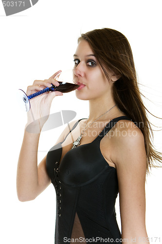 Image of Woman drinking red wine