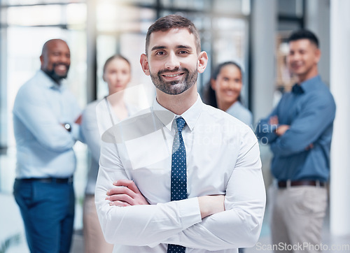 Image of Smile, business people in portrait with team leader and confidence at project management company. Teamwork, commitment and vision, happy team with manager and arms crossed in corporate startup office