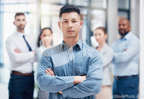 Image of Leadership, business people in portrait arms crossed at startup with confidence and pride at management company. Teamwork, commitment and vision for confident team with support and leader in office.