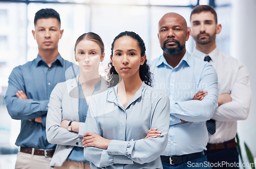 Image of Confident group of business people in portrait with arms crossed, confidence and pride at HR company. Teamwork, commitment and diversity, vision team with woman leadership in human resources office.