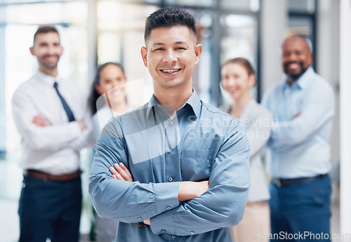 Image of Smile, business people in portrait with arms crossed and boss at startup with confidence and pride. Teamwork, commitment and vision for happy team with man in leadership in project management office.