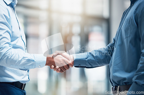 Image of Thank you, businesspeople shaking hands and at office of their workplace together with a lens flare. Partnership or agreement, crm or greeting and colleagues with a handshake for interview at work