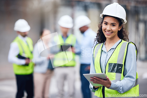 Image of Business woman, architect and tablet in project management or leadership for construction on site. Portrait of female person, engineer or manager with technology and team for industrial architecture